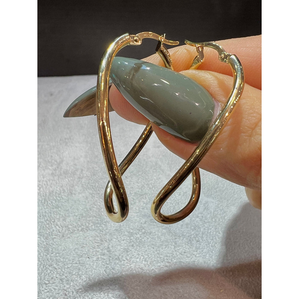 14K Yellow Gold Twist Hoop Earrings: Polished Oval Hoops