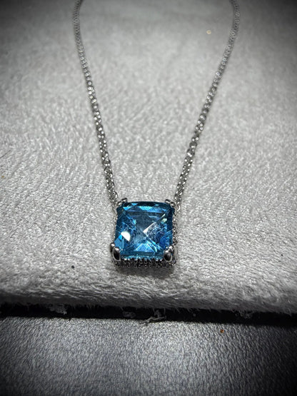 14K White Gold Blue Topaz and Diamond Necklace: 17” Square Checkerboard Cut Blue Topaz