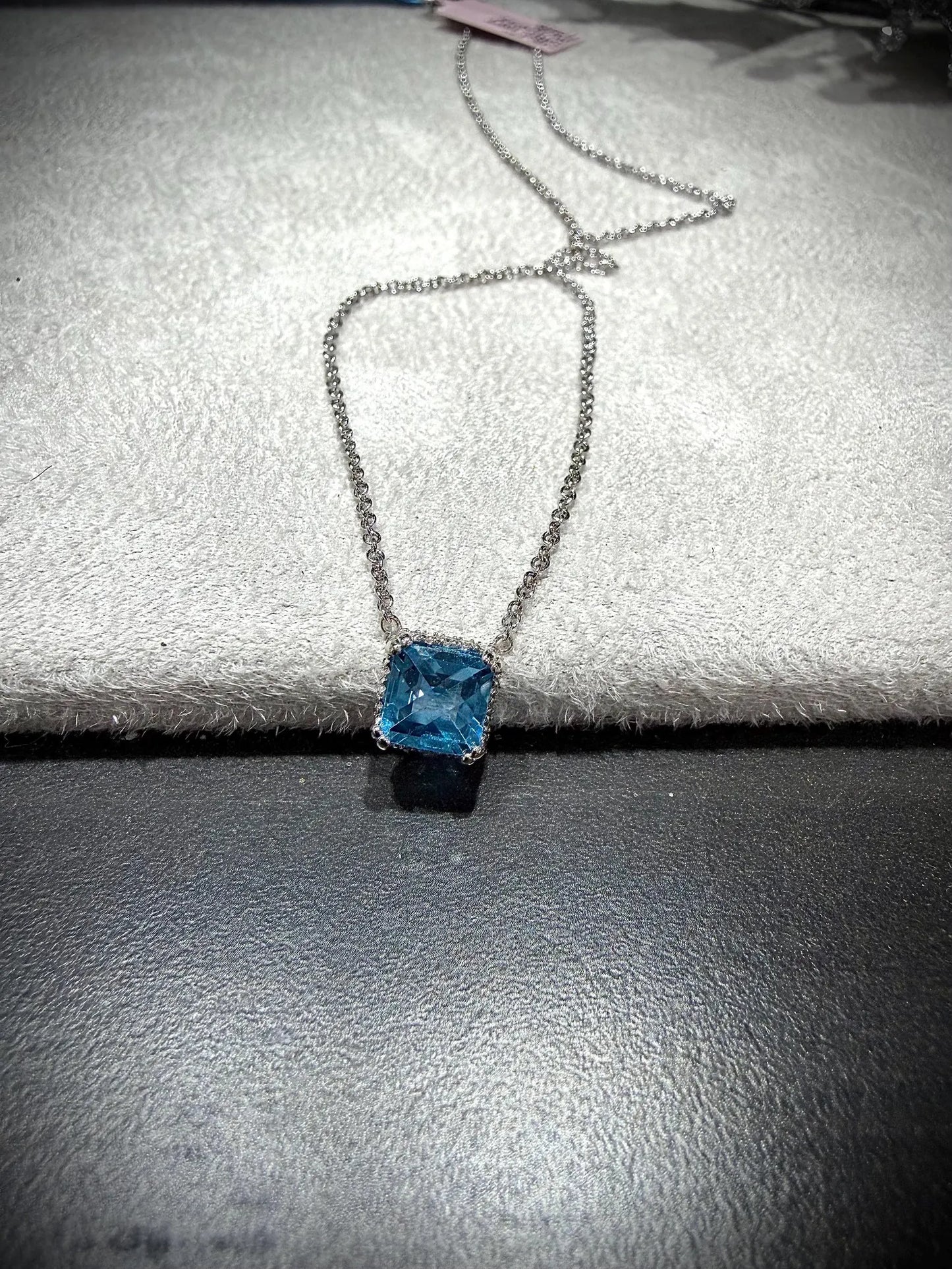 14K White Gold Blue Topaz and Diamond Necklace: 17” Square Checkerboard Cut Blue Topaz