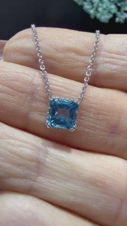 14K White Gold Blue Topaz and Diamond Necklace: 17” Square Checkerboard Cut Blue Topaz